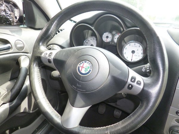 Original Alfa Romeo GT 937 leather steering wheel with radio control